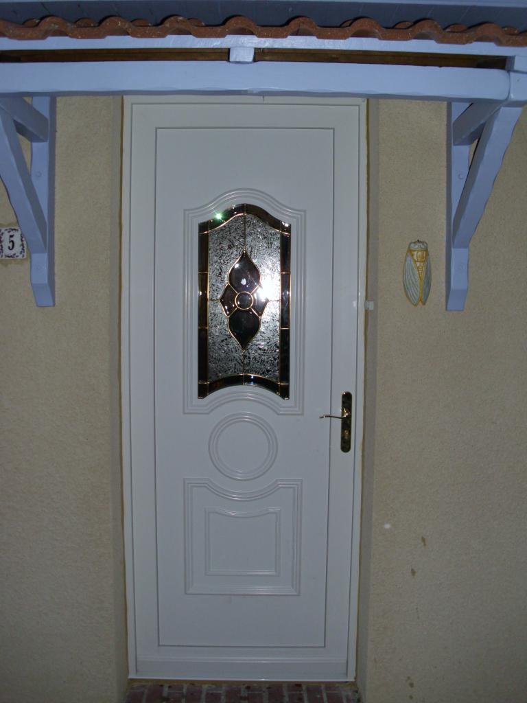 Porte PVC avec panneau décoratif